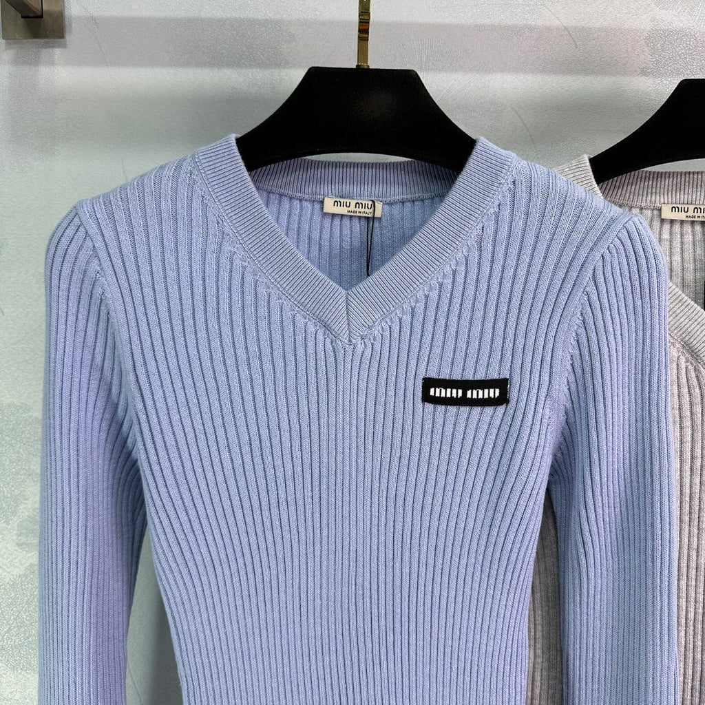 Ribbed High-Neck Wool Sweater