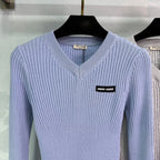 Ribbed High-Neck Wool Sweater